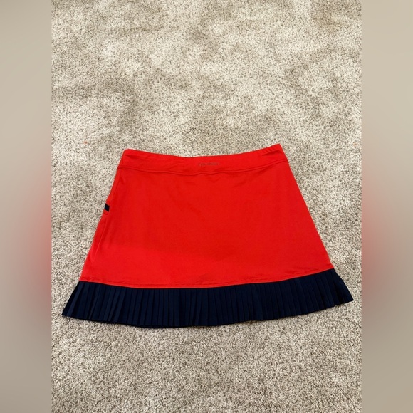 InPhorm NYC Kai Pleated tennis skort in poppy red and navy - Picture 4 of 11